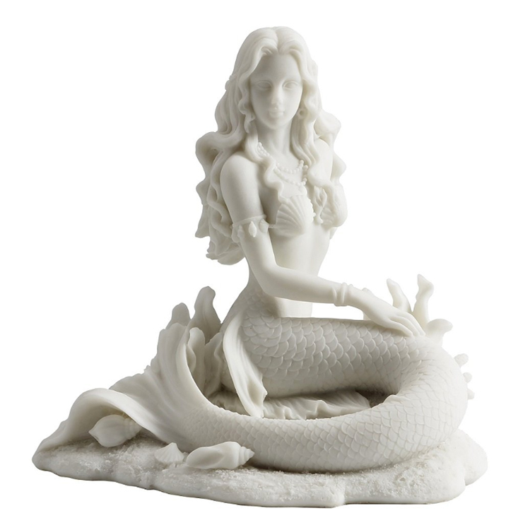 White mermaid sitting on beach sculpture figurine statue
